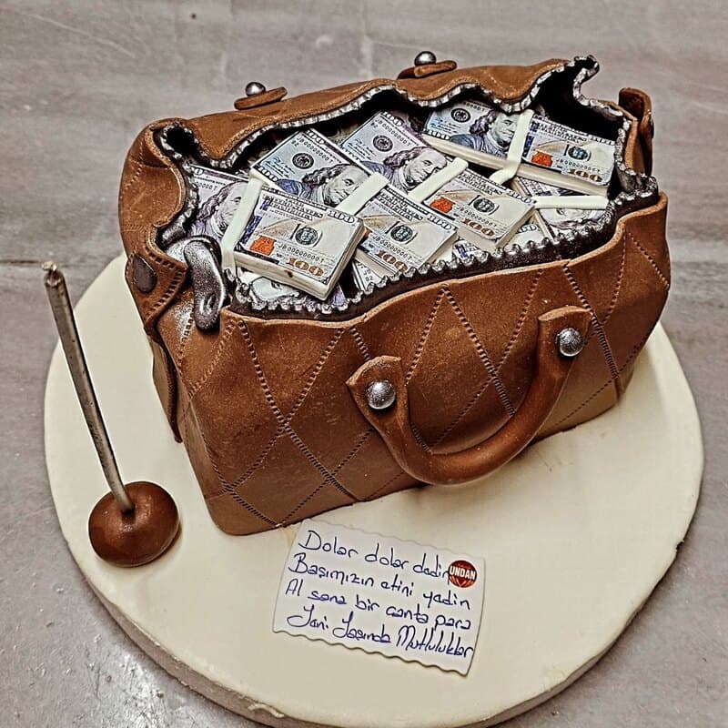 Deri çanta görünümlü, içi dolar desenli sürpriz butik pasta. Kibaroğlu UNDAN Nimetler